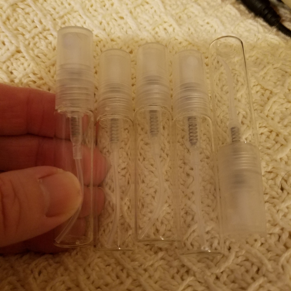 This listing is for 5 refillable empty glass perfume spray bottles 5 ML. Glass